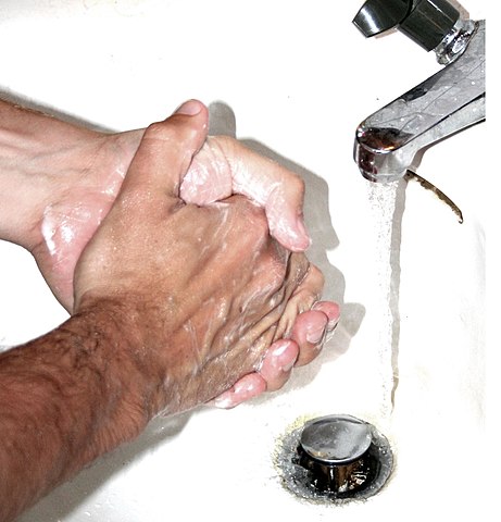 a person washing his hands